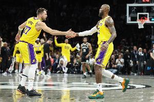 ESPN预测明天胜率：背靠背的七连胜湖人51.7% 热火48.3%